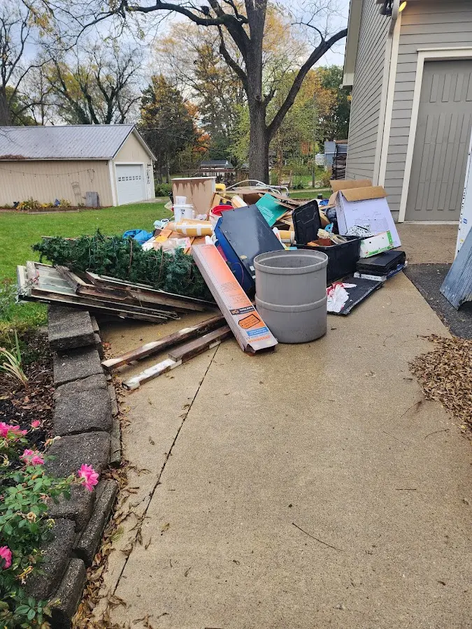 Dumpster being loaded with debris for 30 Yard Dumpster Rental in San Anselmo